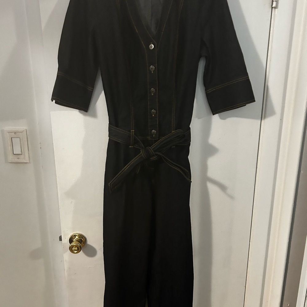 Woman used jeans jumpsuit color black